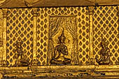 Luang Prabang, Laos - Wat Mai the gilded stucco engravings narrate the Vessantara Jataka, the penultimate rebirth as a human of the future Gotama Buddha. 